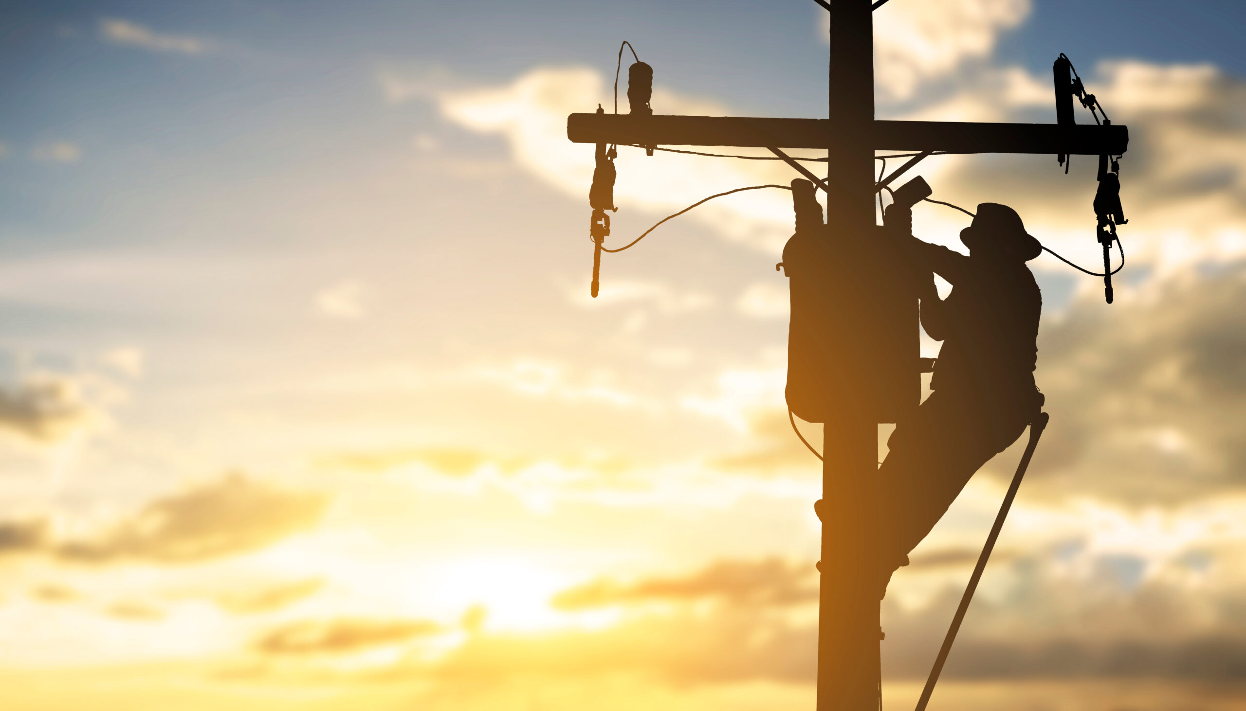 engineer working on electric distribution infrastructure